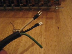 These are the wire ends that attach to the regulators.  I intended to strip out the green wire but it looks like the 3 wires are spiraled so it would be too difficult.  I couldn't find 12/2 with other than extension cord and I didn't like the look of that.